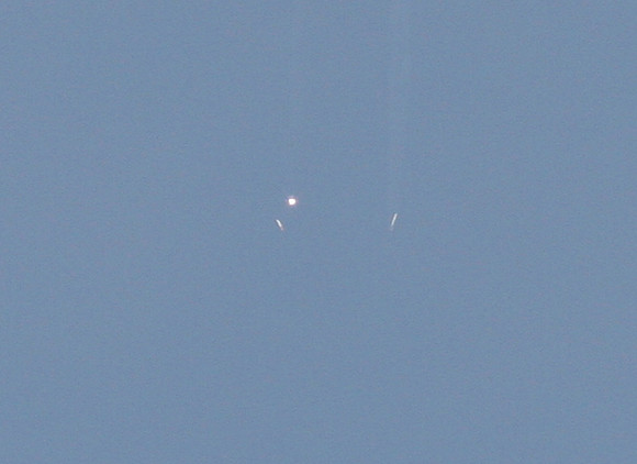 Solid Rocket Motors descending to ocean after flame out